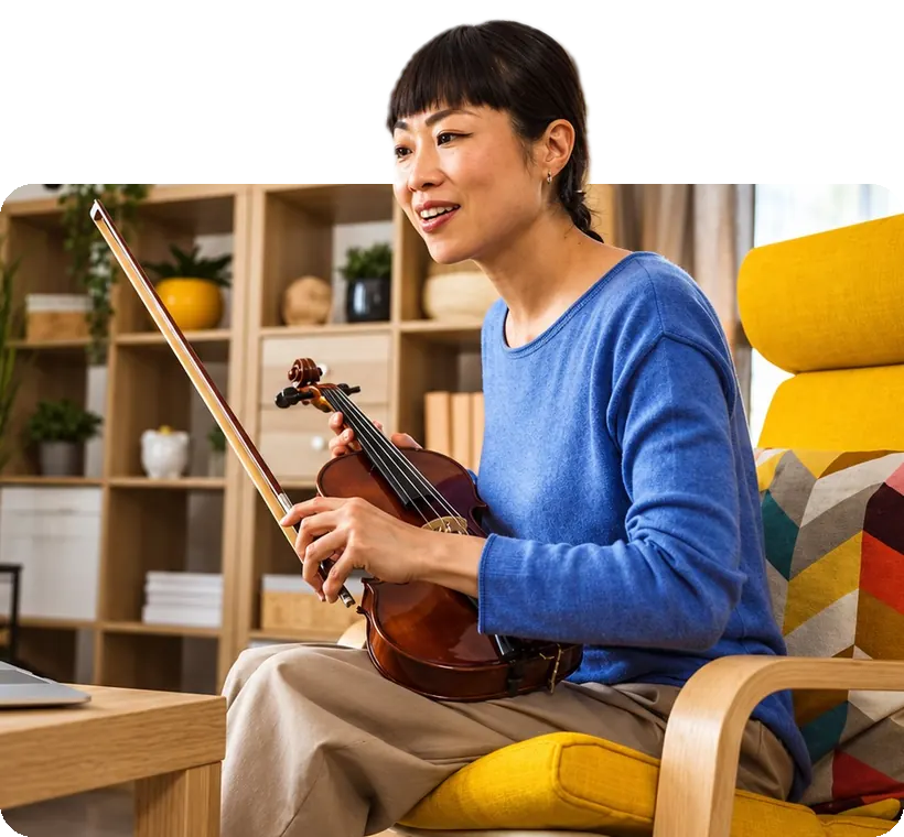 A violin coach teaching from her living room.